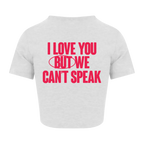 White Cat Burns crop top with pink text 'I LOVE YOU BUT WE CAN'T SPEAK'